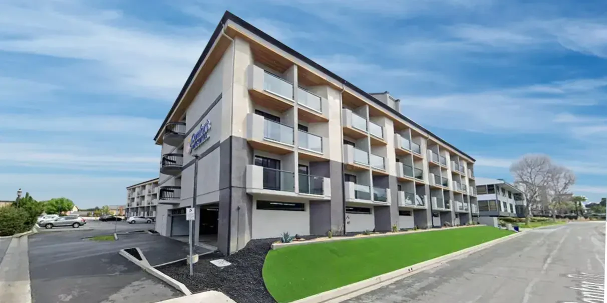 Modern Bayview PACE senior apartment complex in a vibrant community setting.