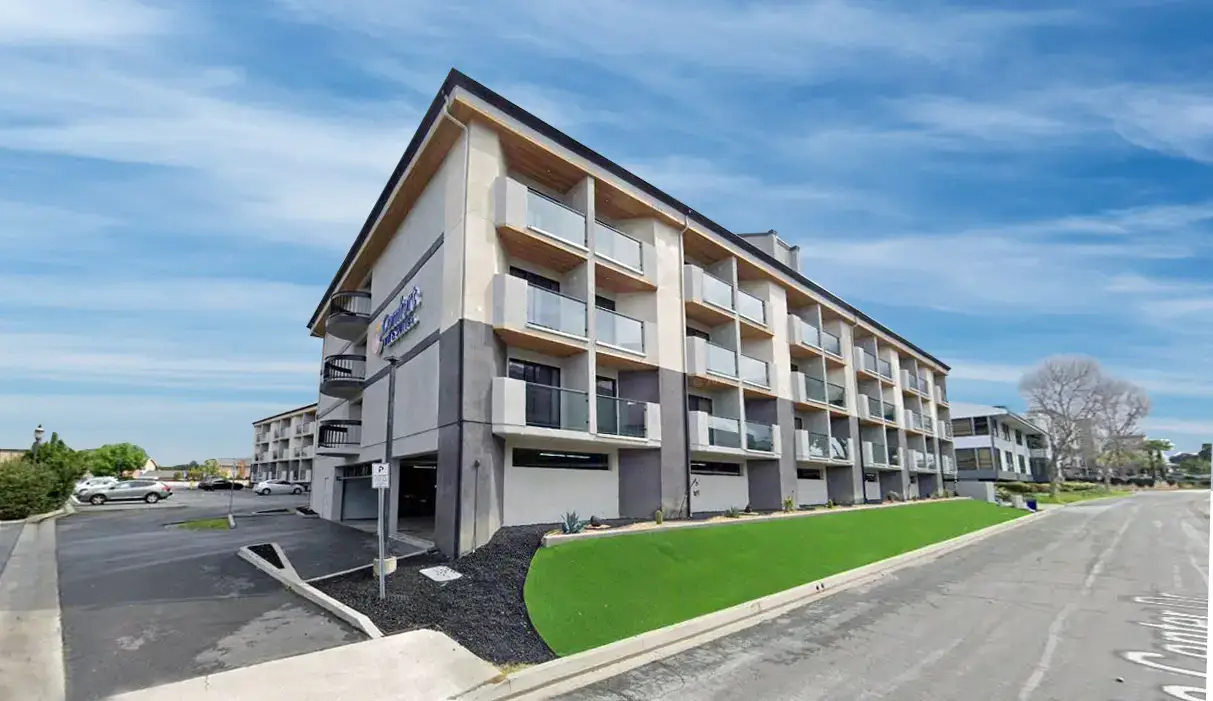 Modern Bayview PACE senior apartment complex in a vibrant community setting.