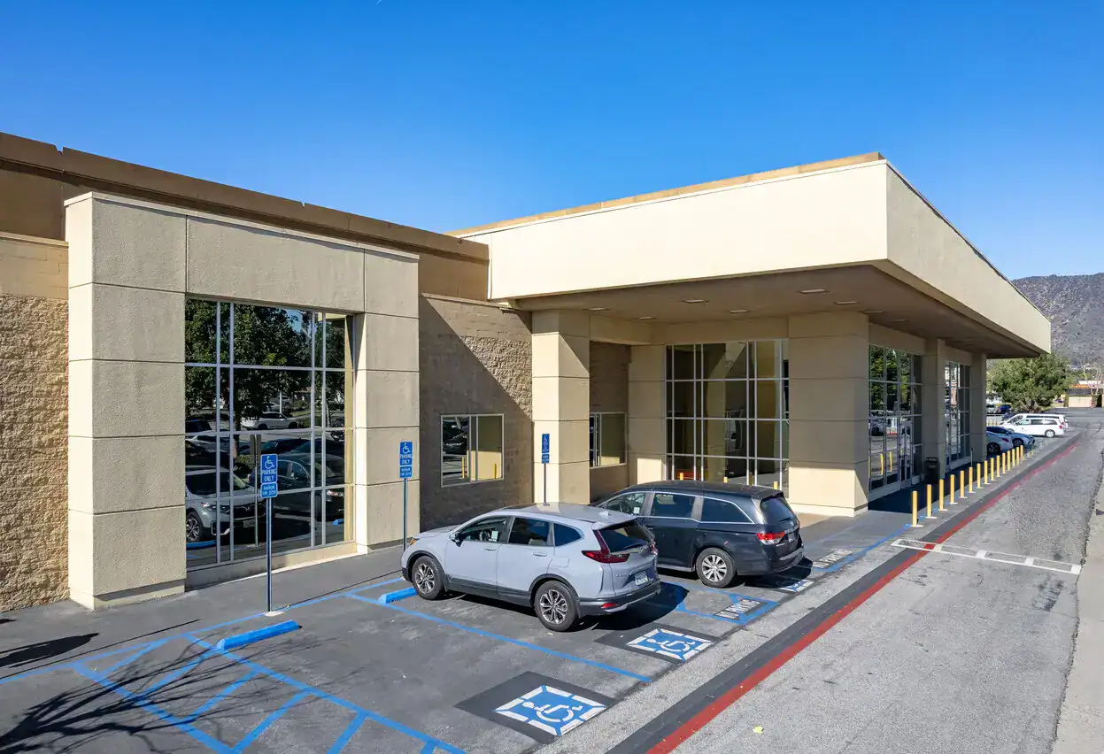 Accessible parking spaces at Bayview PACE facility for seniors and disabled individuals.