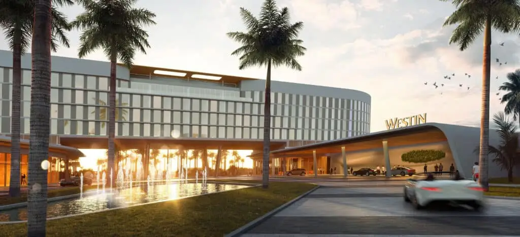 Modern luxury Westin hotel with palm trees and water fountain, sunset lighting, appealing for travelers.