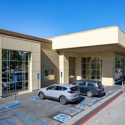 Accessible parking spaces at Bayview PACE facility for seniors and disabled individuals.